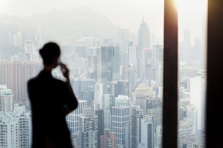 A person talking on a phone in front of a city

AI-generated content may be incorrect.